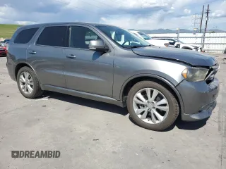 2011 Dodge Durango R/T with VIN 1D4SD6GT0BC682060, listed as a Copart auction lot 60340915 with 118,496 mi miles and Salvage title. Bid and sale history available at DreamBid. Image 4.