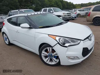 2016 Hyundai Veloster with VIN KMHTC6ADXGU273034, listed as a IAAI auction lot 40420771 with 206,694 mi miles. Bid and sale history available at carsss.com. Image 1.