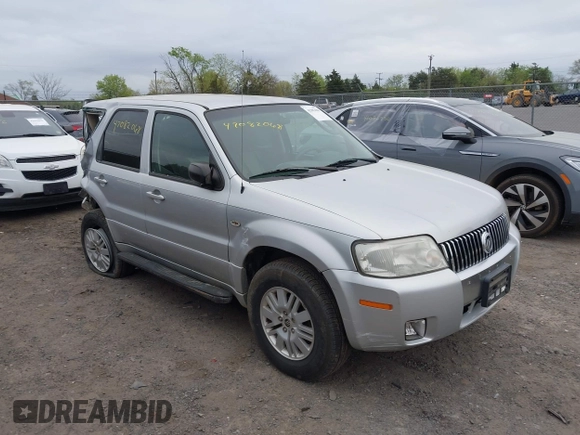 2005 Mercury Mariner Convenience z VIN 4M2YU57Z55DJ18600, wystawiony jako IAAI lot #42082068 z przebiegiem 141 530 mil mil oraz . Historia ofert i sprzedaży dostępna na DreamBid. Obrazek 1.