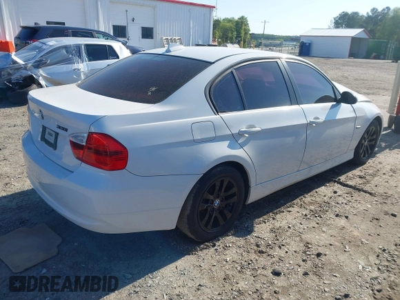 2007 BMW 3 Series 328i with VIN WBAVA33567KX73725, listed as a IAAI auction lot 41985667 with 113,491 mi miles. Bid and sale history available at carsss.com. Image 4.