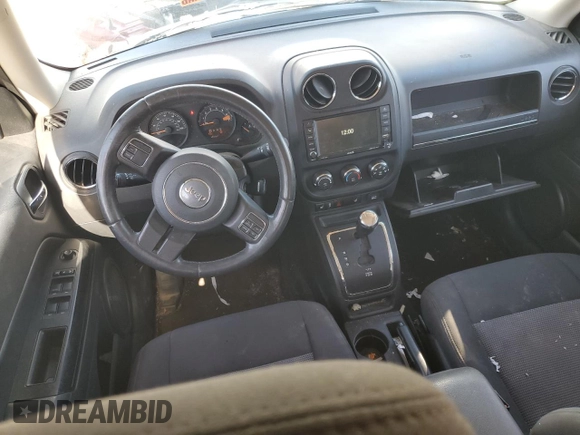 2015 Jeep Patriot High Altitude with VIN 1C4NJRFB5FD169156, listed as a Copart auction lot 50393335 with 122,233 mi miles and Salvage title. Bid and sale history available at DreamBid. Image 8.