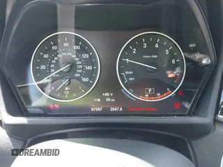 2017 BMW X1 sDrive28i with VIN WBXHU7C37H5H32815, listed as a IAAI auction lot 41837113 with 67,097 mi miles. Bid and sale history available at carsss.com. Image 7.