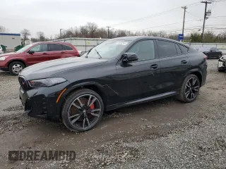 2025 BMW X6 M60i with VIN 5UX43EX02S9W76491, listed as a Copart auction lot 85033264 with 5,173 mi miles and Salvage Title. Bid and sale history available at carsss.com. Image 1.