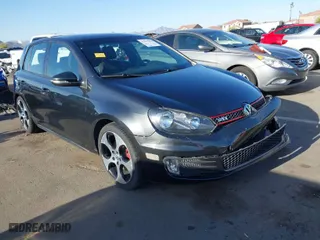 2012 Volkswagen GTI with VIN WVWHV7AJ6CW178615, listed as a IAAI auction lot 41975014 with 60,698 mi miles. Bid and sale history available at carsss.com. Image 1.