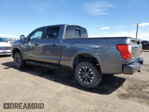 2016 Nissan Titan XD PRO-4X with VIN 1N6BA1F47GN504254, listed as a Copart auction lot 56670974 with 173,312 mi miles and Clean Title. Bid and sale history available at carsss.com. Image 2.