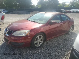 2009 Pontiac G6 GT 1SB with VIN 1G2ZK57K794235866, listed as a Copart auction lot 61416875 with 106,998 mi miles and Clean title. Bid and sale history available at DreamBid. Image 1.