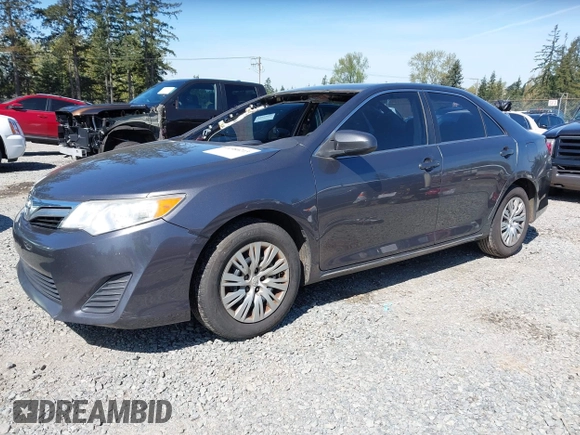 2014 Toyota Camry L with VIN 4T4BF1FK9ER423232, listed as a IAAI auction lot 41980213 with 157,132 mi miles. Bid and sale history available at carsss.com. Image 2.