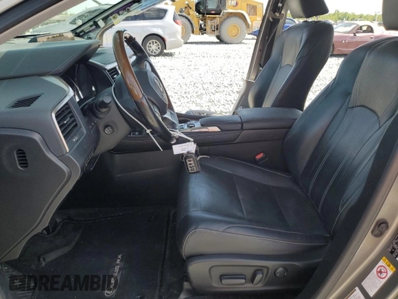 2018 Lexus RX 450hL Premium with VIN JTJDGKCAXJ2004427, listed as a Copart auction lot 55213625 with 94,557 mi miles and Salvage title. Bid and sale history available at DreamBid. Image 7.