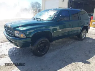 2000 Dodge Durango z VIN 1B4HS28Z0YF170313, wystawiony jako IAAI lot #41690703 z przebiegiem 283 237 mil mil oraz . Historia ofert i sprzedaży dostępna na DreamBid. Obrazek 2.