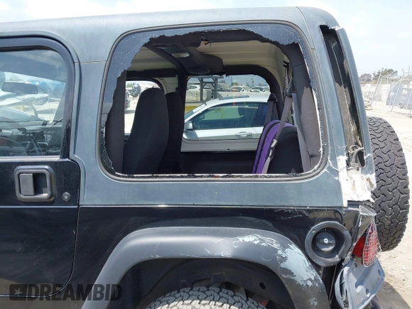 2002 Jeep Wrangler X with VIN 1J4FA39S32P738246, listed as a IAAI auction lot 42106359 with 266,993 mi miles and . Bid and sale history available at DreamBid. Image 6.
