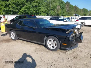 2013 Dodge Challenger SXT z VIN 2C3CDYAG4DH718894, wystawiony jako IAAI lot #42156336 z przebiegiem 153 000 mil mil oraz . Historia ofert i sprzedaży dostępna na DreamBid. Obrazek 1.