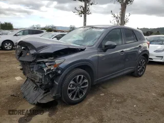 2016 Mazda CX-5 Grand Touring with VIN JM3KE2DY4G0795271, listed as a Copart auction lot 50986845 with 92,323 mi miles and Salvage Title. Bid and sale history available at carsss.com. Image 1.
