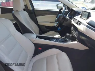 2016 Mazda 6 i Grand Touring with VIN JM1GJ1W57G1403028, listed as a IAAI auction lot 41591235 with 110,079 mi miles and . Bid and sale history available at carsss.com. Image 5.