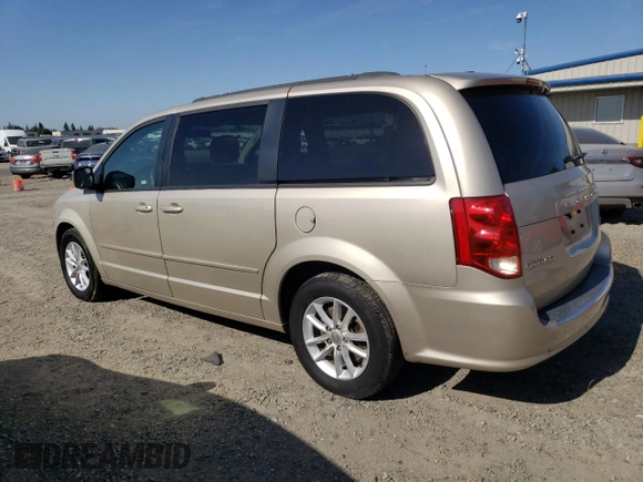 2014 Dodge Grand Caravan SXT z VIN 2C4RDGCG6ER427418, wystawiony jako Copart lot #58804395 z przebiegiem 154 524 mil mil oraz Tytuł czysty. Historia ofert i sprzedaży dostępna na DreamBid. Obrazek 2.