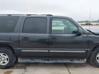 2005 Chevrolet Suburban LT with VIN 3GNEC16Z95G131012, listed as a IAAI auction lot 41249292 with 269,331 mi miles and . Bid and sale history available at DreamBid. Image 14.