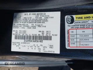 2010 Ford Fusion SPORT with VIN 3FAHP0DC4AR261402, listed as a IAAI auction lot 41751517 with 216,670 mi miles. Bid and sale history available at carsss.com. Image 9.