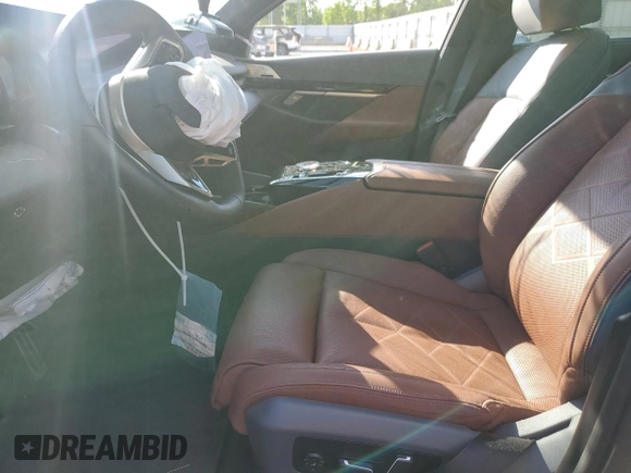 2024 BMW i5 eDrive40 with VIN WBY33FK04RCR49355, listed as a Copart auction lot 55828475 with Not Provided miles and Salvage Title. Bid and sale history available at DreamBid. Image 7.