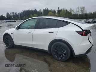 2021 Tesla Model Y Long Range with VIN 5YJYGAEE2MF115988, listed as a Copart auction lot 52206535 with 53,911 mi miles and Salvage Title. Bid and sale history available at DreamBid. Image 2.