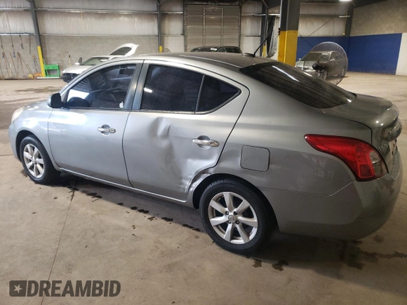 2012 Nissan Versa SV with VIN 3N1CN7AP1CL834615, listed as a Copart auction lot 72217574 with 131,340 mi miles and Salvage Title. Bid and sale history available at carsss.com. Image 2.