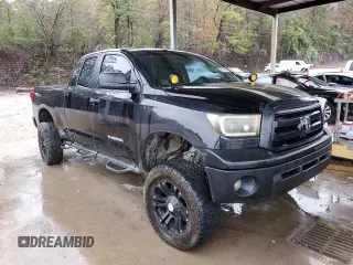 2009 Toyota Tundra 4WD Truck with VIN 5TFBW54109X091217, listed as a Copart auction lot 80756934 with 158,168 mi miles and Salvage Title. Bid and sale history available at carsss.com. Image 4.