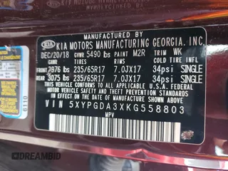 2019 Kia Sorento LX z VIN 5XYPGDA3XKG558803, wystawiony jako Copart lot #57885915 z przebiegiem 70 055 mil mil oraz Szkoda całkowita • Salvage title. Historia ofert i sprzedaży dostępna na DreamBid. Obrazek 12.