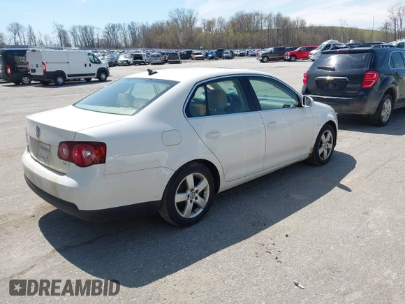 2009 Volkswagen Jetta SE z VIN 3VWRM71K99M057390, wystawiony jako IAAI lot #42094648 z przebiegiem 168 533 mil mil oraz . Historia ofert i sprzedaży dostępna na DreamBid. Obrazek 4.