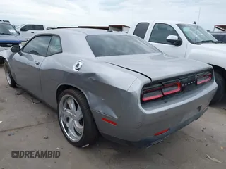 2016 Dodge Challenger SXT Plus z VIN 2C3CDZAG9GH184110, wystawiony jako IAAI lot #42463784 z przebiegiem 160 484 mil mil oraz . Historia ofert i sprzedaży dostępna na DreamBid. Obrazek 3.