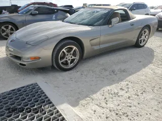 2000 Chevrolet Corvette with VIN 1G1YY32GXY5124274, listed as a Copart auction lot 77097974 with 0 mi miles and Salvage Title. Bid and sale history available at carsss.com. Image 1.
