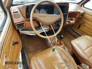 1982 Volkswagen Rabbit z VIN 1V1KG0175CV012235, wystawiony jako Copart lot #86112834 z przebiegiem 186 959 mil mil oraz Szkody całkowita. Historia ofert i sprzedaży dostępna na DreamBid. Obrazek 8.