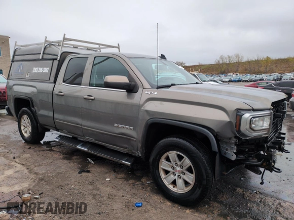 2017 GMC Sierra 1500 SLE z VIN 1GTV2MEC5HZ177175, wystawiony jako Copart lot #53640195 z przebiegiem 100 252 mil mil oraz Szkoda całkowita • Salvage title. Historia ofert i sprzedaży dostępna na DreamBid. Obrazek 4.