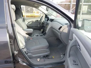 2015 Chevrolet Traverse LS z VIN 1GNKVFEDXFJ134436, wystawiony jako IAAI lot #41773596 z przebiegiem 156 326 mil mil oraz . Historia ofert i sprzedaży dostępna na DreamBid. Obrazek 5.