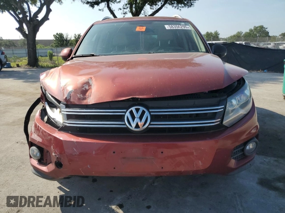 2012 Volkswagen Tiguan SE with VIN WVGAV7AX9CW003857, listed as a Copart auction lot 58356295 with 202,794 mi miles and Salvage title. Bid and sale history available at DreamBid. Image 5.