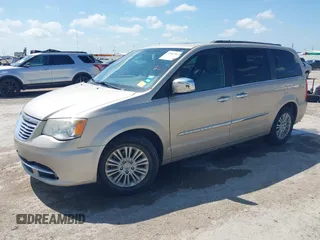 2013 Chrysler Town & Country Touring L with VIN 2C4RC1CG2DR767406, listed as a IAAI auction lot 42067814 with 75,985 mi miles and . Bid and sale history available at DreamBid. Image 2.