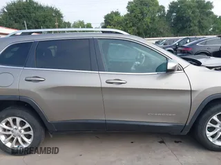 2019 Jeep Cherokee Latitude with VIN 1C4PJLCBXKD416644, listed as a IAAI auction lot 42261057 with 93,849 mi miles and . Bid and sale history available at DreamBid. Image 14.