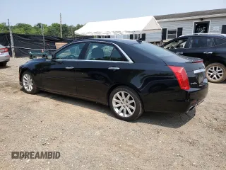 2014 Cadillac CTS Luxury AWD with VIN 1G6AX5SXXE0120681, listed as a Copart auction lot 60076655 with 99,552 mi miles and Salvage title. Bid and sale history available at DreamBid. Image 2.