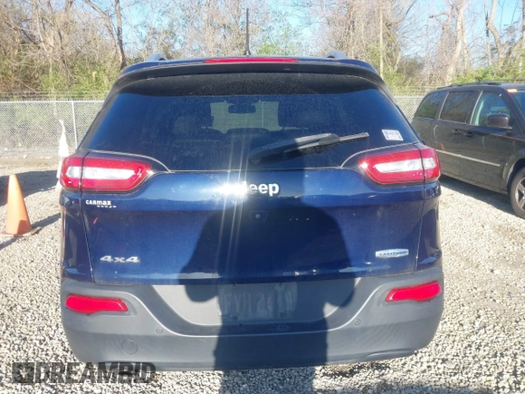 2015 Jeep Cherokee Latitude with VIN 1C4PJMCB1FW709560, listed as a IAAI auction lot 42035619 with 162,354 mi miles. Bid and sale history available at carsss.com. Image 16.