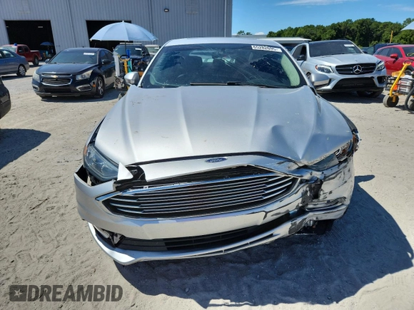2017 Ford Fusion SE с VIN 3FA6P0H75HR226737, выставлен на аукционе Copart как лот 65282695 с пробегом Не указан миль и Чистый • Clean title. История ставок и продаж доступна на DreamBid. Изображение 5.
