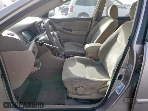 2003 Toyota Corolla CE with VIN 1NXBR32E13Z099137, listed as a Copart auction lot 49283665 with 219,671 mi miles and Salvage Title. Bid and sale history available at DreamBid. Image 7.
