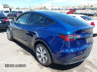 2024 Tesla Model Y Long Range with VIN 7SAYGDEE6RA242980, listed as a IAAI auction lot 40121685 with 9,126 mi miles and . Bid and sale history available at DreamBid. Image 3.