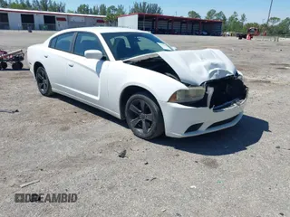 2013 Dodge Charger SE with VIN 2C3CDXBG9DH705485, listed as a IAAI auction lot 41788288 with 134,751 mi miles. Bid and sale history available at carsss.com. Image 1.