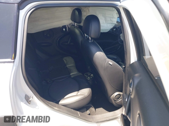 2015 MINI Countryman S with VIN WMWZC3C58FWT05613, listed as a IAAI auction lot 42374870 with 124,214 mi miles and . Bid and sale history available at DreamBid. Image 8.