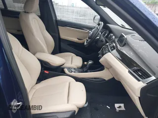 2018 BMW X1 xDrive28i with VIN WBXHT3C32J5L33213, listed as a IAAI auction lot 42513235 with 75,918 mi miles and . Bid and sale history available at DreamBid. Image 5.