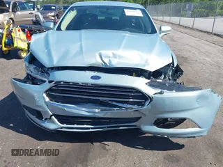 2014 Ford Fusion SE Hybrid with VIN 3FA6P0LU3ER373311, listed as a IAAI auction lot 42048513 with 155,935 mi miles. Bid and sale history available at carsss.com. Image 6.