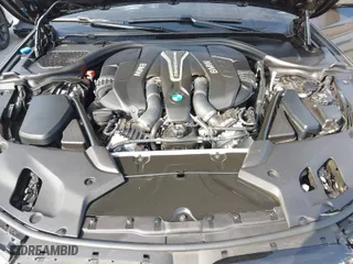 2018 BMW 5 Series M550i xDrive with VIN WBAJB9C57JB286667, listed as a IAAI auction lot 41616264 with 55,482 mi miles. Bid and sale history available at carsss.com. Image 10.