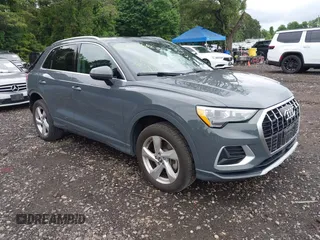 2020 Audi Q3 Premium with VIN WA1AECF3XL1005708, listed as a IAAI auction lot 42701866 with 37,347 mi miles and . Bid and sale history available at DreamBid. Image 1.