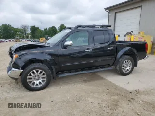 2011 Nissan Frontier Pro-4X with VIN 1N6AD0EVXBC433028, listed as a Copart auction lot 57653305 with 144,753 mi miles and Salvage title. Bid and sale history available at DreamBid. Image 1.