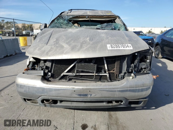 2000 GMC Yukon SLE with VIN 1GKEK13T2YJ130870, listed as a Copart auction lot 82887054 with 310,765 mi miles and Salvage Title. Bid and sale history available at carsss.com. Image 5.