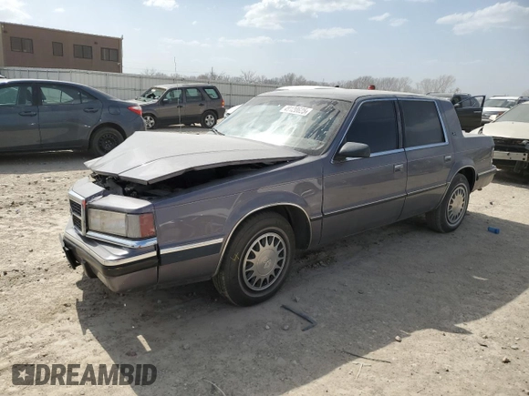 1993 Dodge Dynasty z VIN 1B3XC4638PD195963, wystawiony jako Copart lot #49120625 z przebiegiem 86 825 mil mil oraz Szkoda całkowita • Salvage title. Historia ofert i sprzedaży dostępna na DreamBid. Obrazek 1.