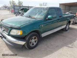 2000 Ford F-150 Work Series with VIN 1FTRX17W8YKA87939, listed as a IAAI auction lot 41882284 with 1 mi miles. Bid and sale history available at carsss.com. Image 18.