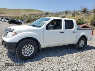 2019 Nissan Frontier Pro-4X with VIN 1N6AD0EV1KN726563, listed as a Copart auction lot 59562995 with 195,113 mi miles and Salvage title. Bid and sale history available at DreamBid. Image 1.